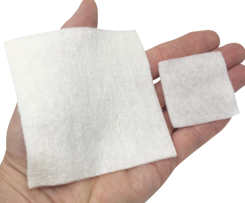 AllaQuix Lite Stop Bleeding Gauze pads 2x2 and 4x4 shown in adult hand for scale